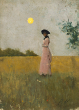 View of a Lady in Pink standing in a Cornfield