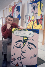 Portrait of American pop artist Roy Lichtenstein (1923 - 1997) as he poses with his painting 'It Is?With Me!', 1963. On the wall beside him (at right) is his painting 'Woman with Flowered Hat' which, in 2013, was sold for 56.1 million dollars, making it (at the time) the highest price ever paid for one of Lichtenstein's works. (Photo by John Loengard/The LIFE Picture Collection via Getty Images)